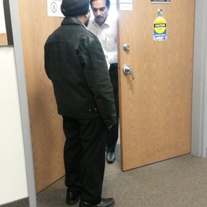 Photo of BLS International Services Canada - Brampton, ON, Canada. There's a guard at the door. Letting people in and out.