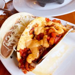 Las Flores - A Grilled Shrimp (Cameron) with Chipotle Crema and a Refried Bean (Frijoles De Casa) Taco