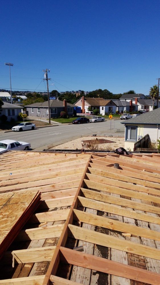 Slide of Caruzo's Roofing Contractors