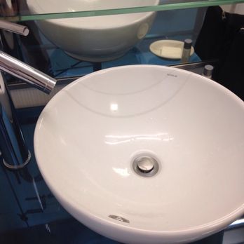 Hotel Murano - Bathroom faucet and basin - Hotels Near Me - Tacoma, Washington Hotel Murano - Bathroom faucet and basin - Hotels Near Me - Tacoma, Washington