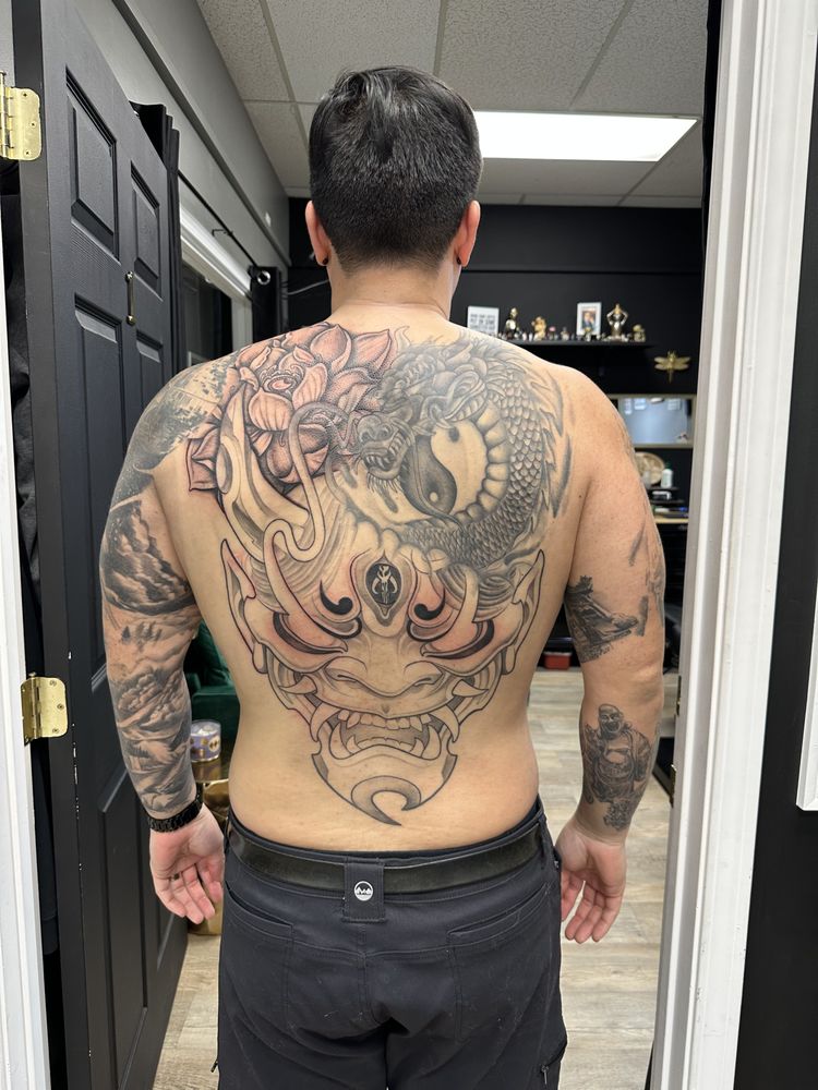 Location Tattoo and Spa Logo