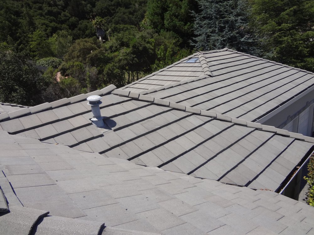 Slide of Dynamite Roofing