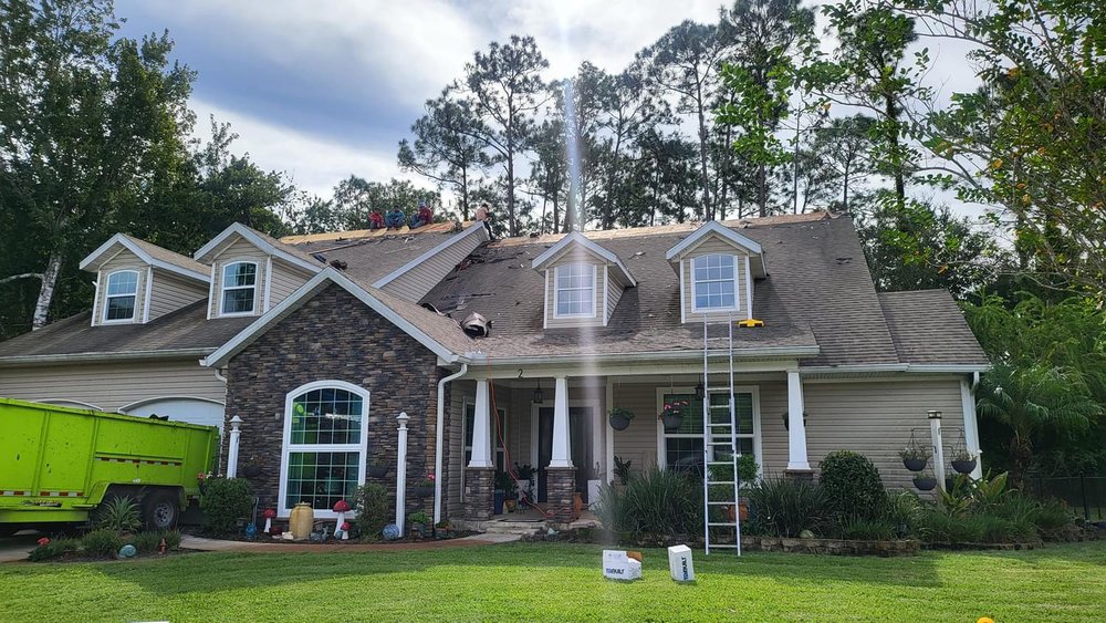 Slide of Bruzz Roofing