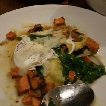 Coltivare - Potato ravioli with poached duck egg - Italian Near Me - Houston, Texas Coltivare - Potato ravioli with poached duck egg - Italian Near Me - Houston, Texas