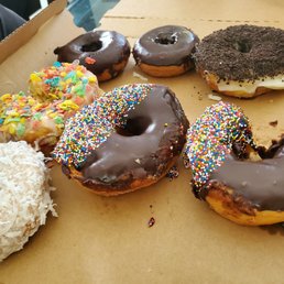 a variety of donuts in a box