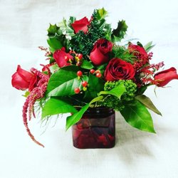 Flowers By Lili - This is the Beaitiful Arrangement Lynn H. Complained about.  Clearly she's lied on her review. Natural greenery.  Fresh,  Not Dead Flowers.