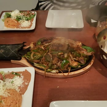 La Fiesta Mexican Cocina Ormond Beach - Fajitas for 2. Steak, chicken, pork, and shrimp. DosX Amber - Mexican Near Me - Ormond Beach, Florida La Fiesta Mexican Cocina Ormond Beach - Fajitas for 2. Steak, chicken, pork, and shrimp. DosX Amber - Mexican Near Me - Ormond Beach, Florida