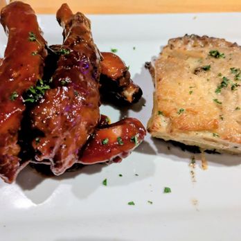 Oven + Vine - BBQ pork baby back ribs with au gratin potatoes - New American Near Me - Phoenix, Arizona