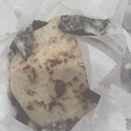 a burrito in a wrapper a burrito in a wrapper