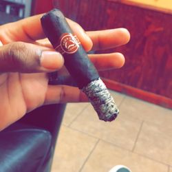 Habana Port Cigar Merchants - Enjoying this Padron in the Habana Port smoke room! Great cigar!