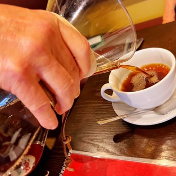 Sugar Rush Cafe - a person pouring a cup of coffee - Breakfast & Brunch Near Me - Walnut, California
