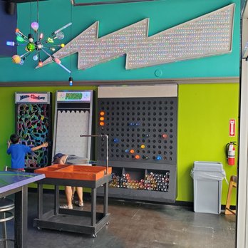 Kilowatt Brewing - Oceanside - Interior game wall - Pubs Near Me - Oceanside, California Kilowatt Brewing - Oceanside - Interior game wall - Pubs Near Me - Oceanside, California