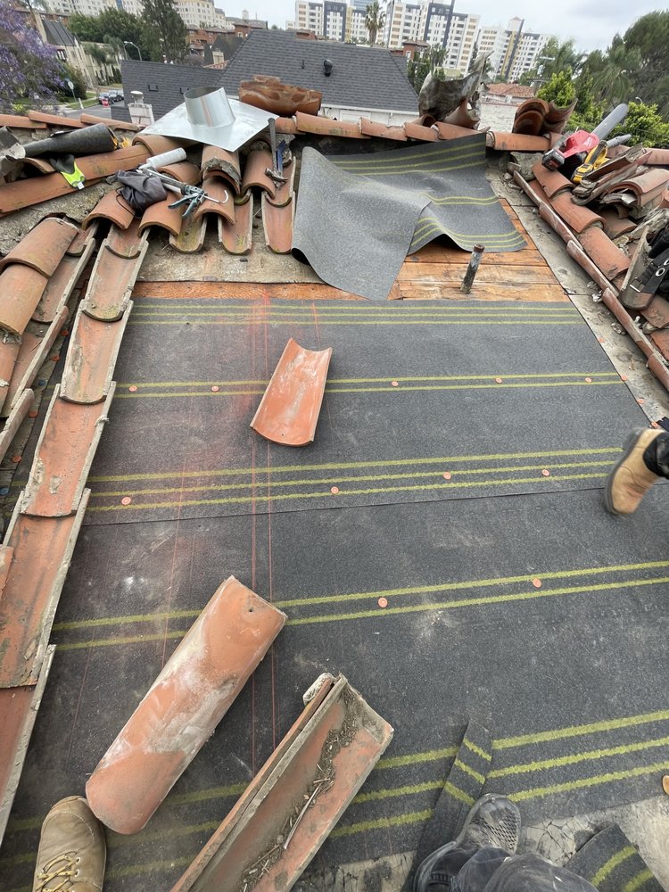 Slide of Global Elite Roofing