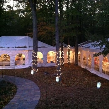 American Rentals - L-shaped tents to fit around the trees. - Party Equipment Rentals Near Me - Kingsley, Michigan American Rentals - L-shaped tents to fit around the trees. - Party Equipment Rentals Near Me - Kingsley, Michigan