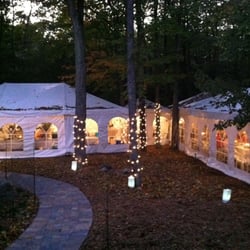 American Rentals - L-shaped tents to fit around the trees.
