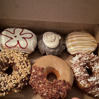 Shaka Donuts - Delicious! (From top left to right) A guava donut, Guinness iced chocolate cake donut, banana foster, peanuty, maple bacon, samoa - Donuts Near Me - Orlando, Florida Shaka Donuts - Delicious! (From top left to right) A guava donut, Guinness iced chocolate cake donut, banana foster, peanuty, maple bacon, samoa - Donuts Near Me - Orlando, Florida