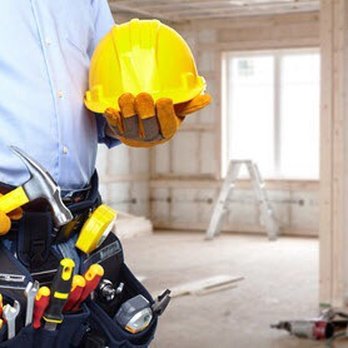 Better Call Saul Home Services - a construction worker holding tools - General Contractors Near Me Better Call Saul Home Services - a construction worker holding tools - General Contractors Near Me