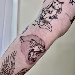 Cryptid Ink Tattoos - Bunny and panther both by Mars!