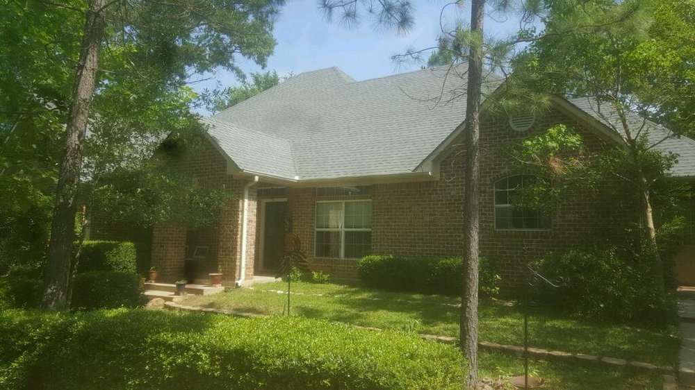 Slide of ETX Roofing