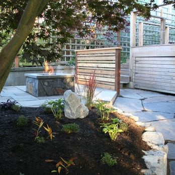 Sage and Stone - Iron mountain flagstone walkway leads into a dimensional bluestone patio with gas fire-pit. - Landscaping Near Me Sage and Stone - Iron mountain flagstone walkway leads into a dimensional bluestone patio with gas fire-pit. - Landscaping Near Me