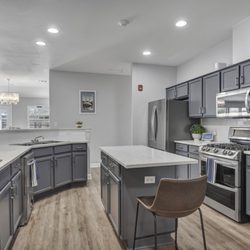 Bouquet Homes Assisted Living & Memory Care - The Primrose - Kitchen - Central to the home, mouth-watering aromas are always just around the corner.