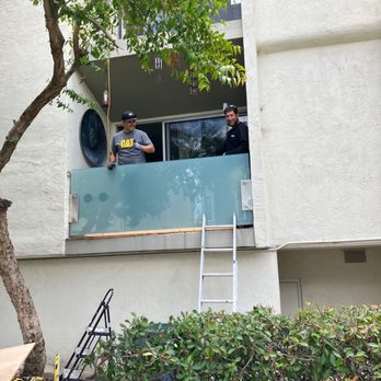 Premium Windows & Glass - Working on one of the balconies - Windows Installation Near Me Premium Windows & Glass - Working on one of the balconies - Windows Installation Near Me