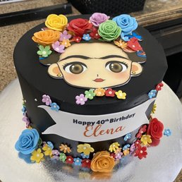 a cake decorated with a fridable a cake decorated with a fridable