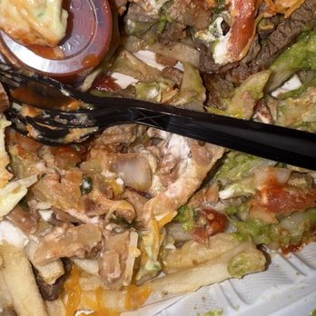 Cotijas Taco Shop - Fingernail inside Carne Asada Fries - Mexican Near Me - Santee, California