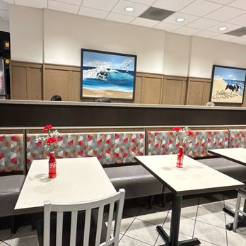 Chick-fil-A - ows a man sitting at a table in a restaurant - Fast Food Near Me - Westminster, California