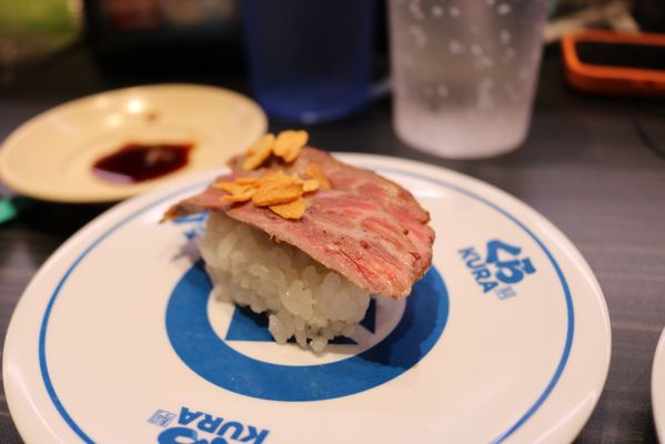 Kura Revolving Sushi Bar by null