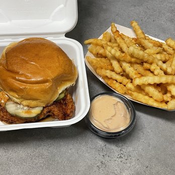 Queen Mother’s Kitchen - Spicy Buffalo Chicken Sandwich and Duck Fat Fries with mother sauce (mayonnaise and ketchup) - Sandwiches Near Me - Arlington, Virginia Queen Mother’s Kitchen - Spicy Buffalo Chicken Sandwich and Duck Fat Fries with mother sauce (mayonnaise and ketchup) - Sandwiches Near Me - Arlington, Virginia