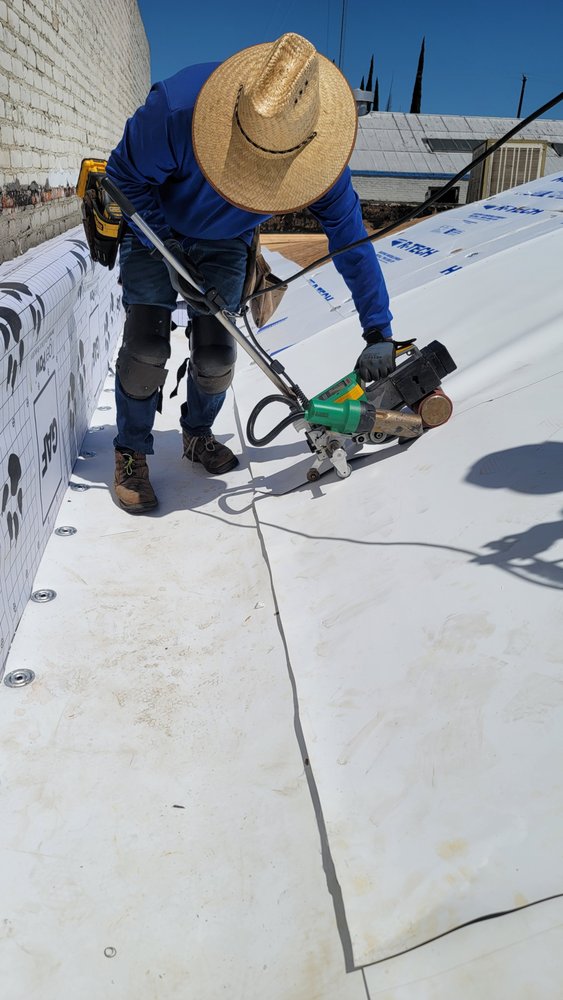 Slide of Claudex Roofing