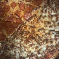 Casey's - My sausage and pepperoni combination  pizza . I ordered three of these. They literally did all three this way.