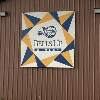 Bells Up Winery - a sign on the side of a building - Wineries Near Me - Newberg, Oregon