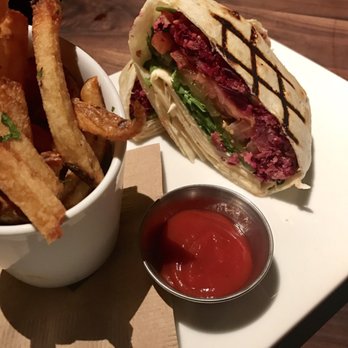 Eureka! - The hamburger bun is not vegan so we substituted it and got it tortilla wrapped, unique delicious veggie patty! - American Near Me - Boise, Idaho