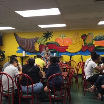 Neveria Sabor Latino - Plenty of seating and a fun mural. - Ice Cream & Frozen Yogurt Near Me - Denver, Colorado