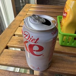 Damaged can flat soda