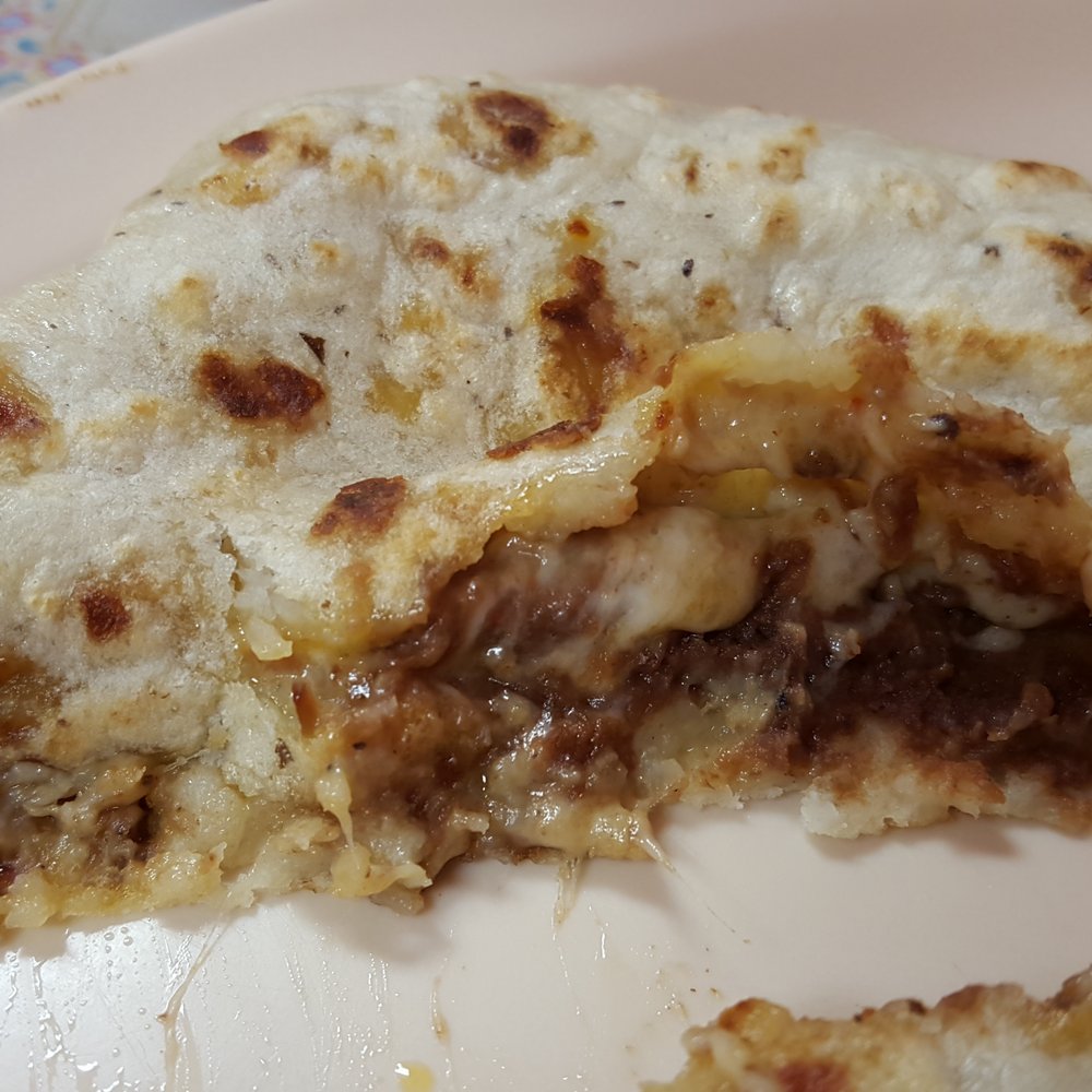 Lupita's Restaurant - Pupusa revuelta slightly exploded cross-section - Mexican Near Me - Costa Mesa, California