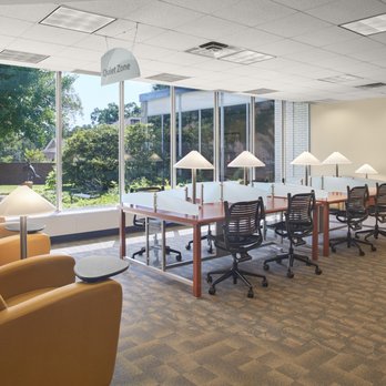 Stow-Munroe Falls Public Library - Our quiet area, overlooking the Reading Garden. - Libraries Near Me - Stow, Ohio