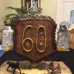 Just Eat It Cake Art - 60th birthday Colombian Aguardiente,crown,emeralds, coins, PasoFinos-crocodile leather fondant-chocolate cake cookies &cream filling.
