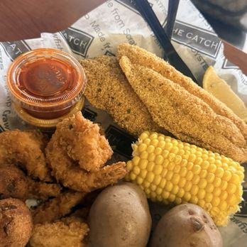 The Catch - Combo Basket with shrimp and fish corn and potatoes - Desserts Near Me - Dallas, Texas The Catch - Combo Basket with shrimp and fish corn and potatoes - Desserts Near Me - Dallas, Texas