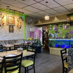 Vegan My Thai - Inside is so cute, cozy and beautifully decorated (besides the large photos of food on wall)