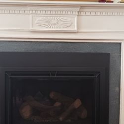 Alaskan Fireplace - New insert looks good when it is OFF.