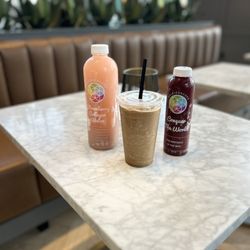 Iced protein coffee, strawberry collagen water & conquer the world juice.