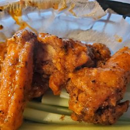 Chicken wings with their homemade hot sauce