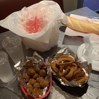 King Cajun Crawfish - Hush Puppies, Onion Rings, Hot French Bread - 12" - Cajun/Creole Near Me - Orlando, Florida King Cajun Crawfish - Hush Puppies, Onion Rings, Hot French Bread - 12" - Cajun/Creole Near Me - Orlando, Florida