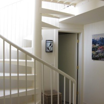 Tom Redmond Construction - a spiral staircase in a home - General Contractors Near Me - Novato, California Tom Redmond Construction - a spiral staircase in a home - General Contractors Near Me - Novato, California