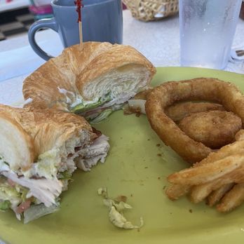 Mr D'z Route 66 Diner - Club Croissant Sandwich, onion rings, fries were from my Sister's dish. - Diners Near Me - Kingman, Arizona Mr D'z Route 66 Diner - Club Croissant Sandwich, onion rings, fries were from my Sister's dish. - Diners Near Me - Kingman, Arizona