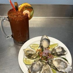 Los Cabos Mexican and Seafood - Michelada Monday is so worth it, only $7.99 for a stacked michelada!?!? The oysters are so fresh and compliment the michelada very well.