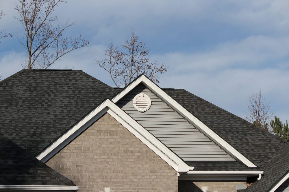 Slide of Gentle Giant Roofing